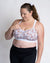 Happy active mum wearing maternity sports bra for large cup sizes