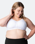 happy mum wearing lightly padded sports bra
