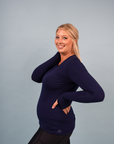 happy, full length image of mother wearing long sleeve blue bamboo top