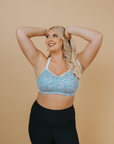 happy pregnant woman wearing her a supportive nursing bra