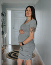 Expecting mother wearing maternity & nursing dress with short sleeves in grey