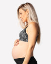 pregnant mother wearing a custom print zip front closure nursing bra 