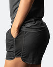 Side view of nursing tank and maternity shorts