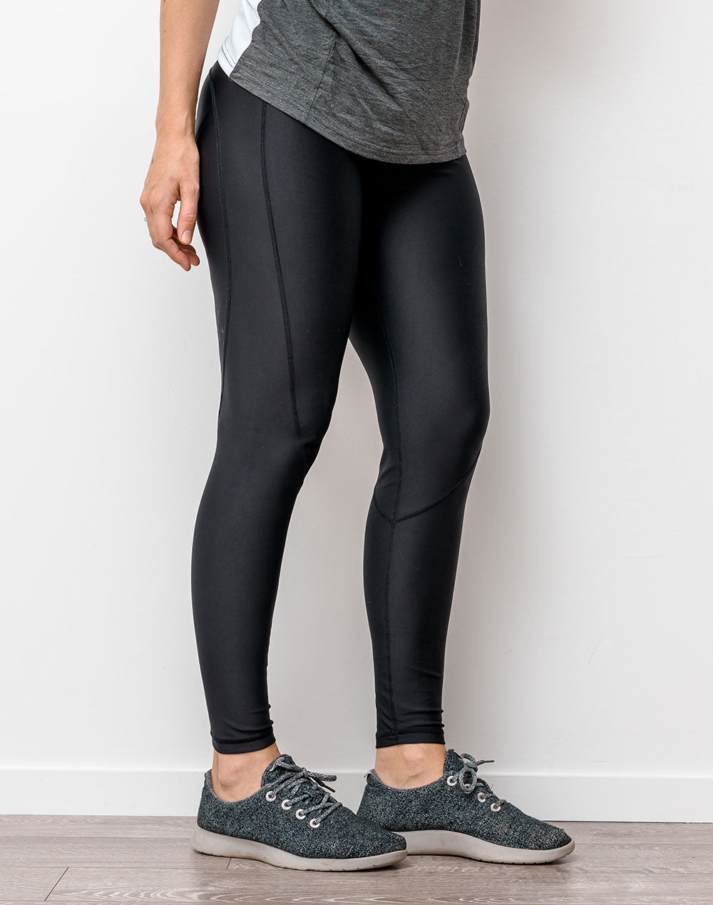 active mum wearing black full length maternity leggings to yoga