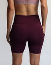 Back view of postpartum bike shorts with pockets
