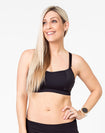 front view of a mom wearing a black maternity activewear bra 