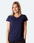 Happy, fit mum wearing tui blue breastfeeding scoop tee