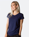 Happy mum wearing scoop tee in tui blue