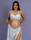 Pregnant mother wearing nursing bikini top and sarong