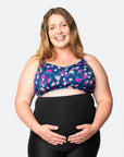 Pregnant mother wearing floral nursing sports bra